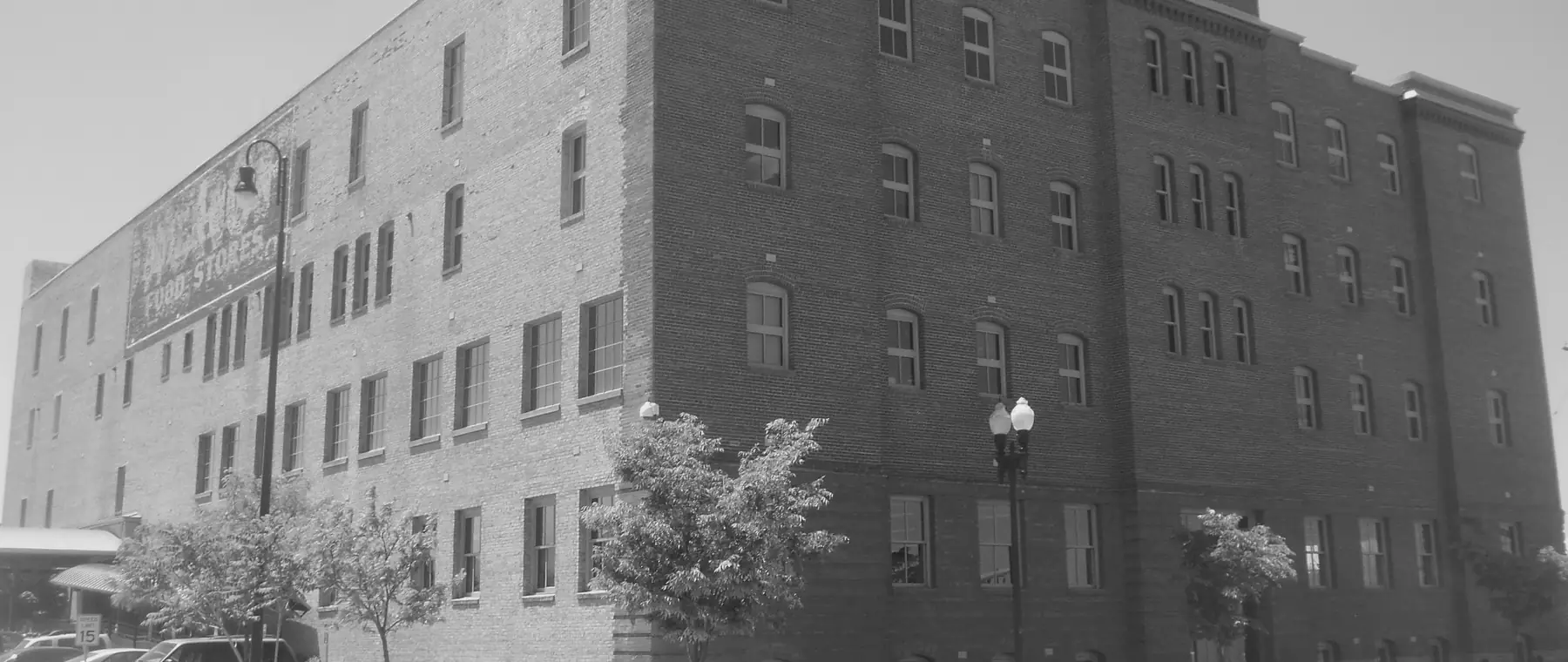The historic Scowcroft Warehouse in downtown Ogden, Utah, in the pre-war district where Low-Key Locksmith services original mortise hardware