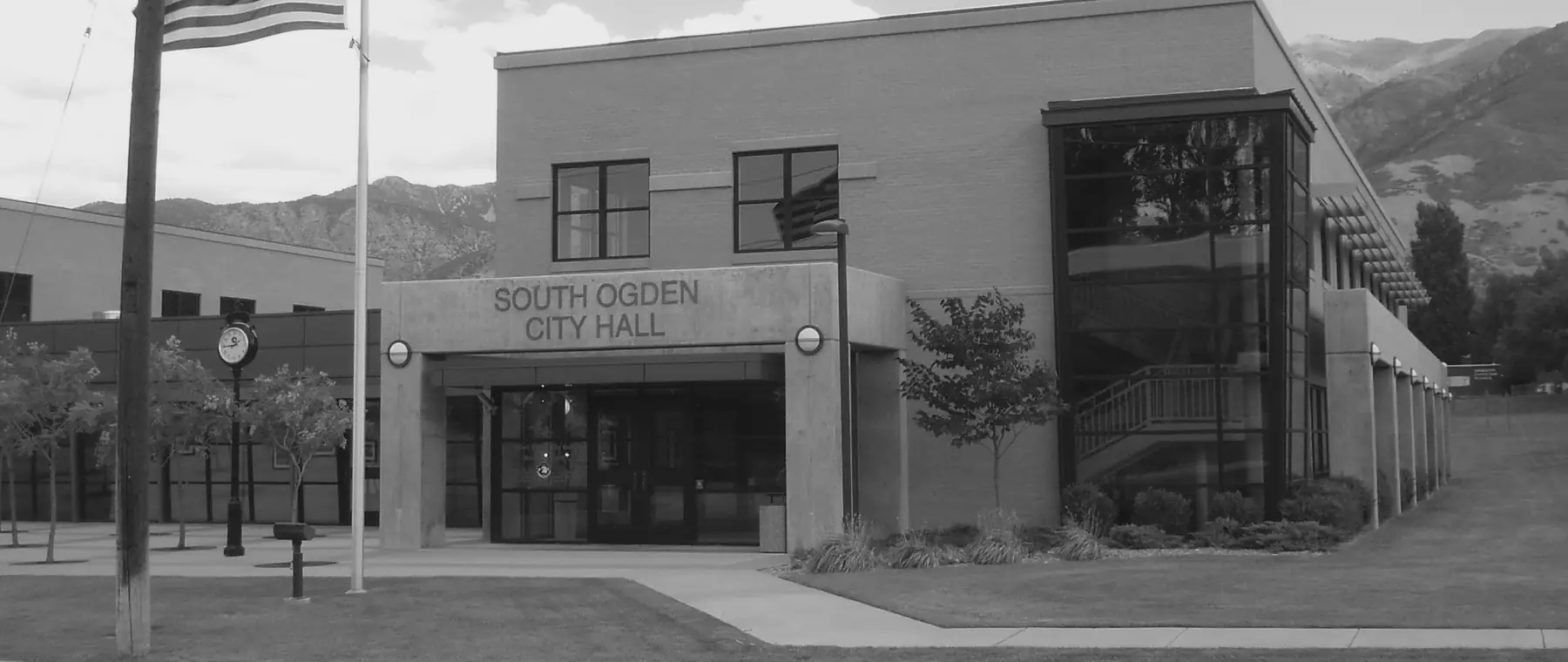 South Ogden City Hall in South Ogden, Utah, with the Wasatch Range behind it